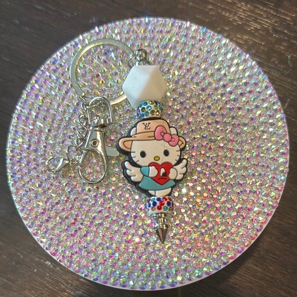Cute Character Keychain with Silver Accents